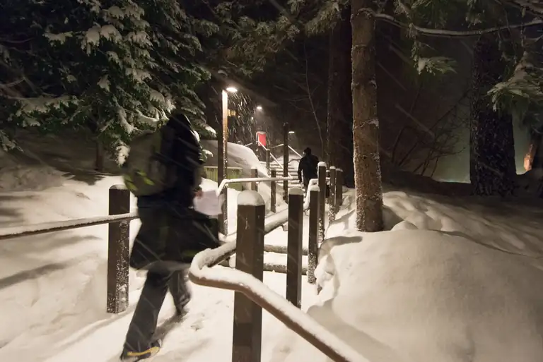people ascending a snowy staircase at Granlibakken Lodge