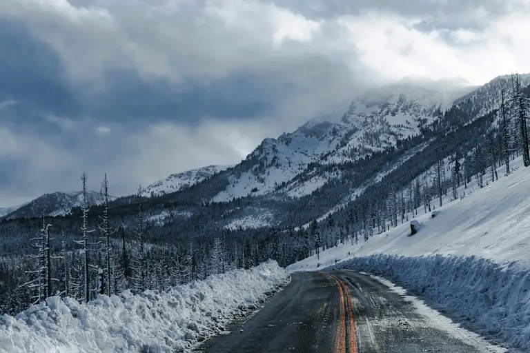 a snow-lined mountain road in the Lake Tahoe region