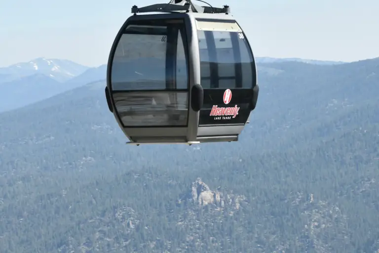 a Lake Tahoe gondola above forested mountain ridges